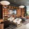 stylish library with built in book shelves and midcentury furniture