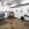 pet grooming room with wash and dry stations