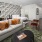 stylish living room with patterned wallpaper