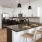 kitchen with an island, modern appliances and spacious counter-space